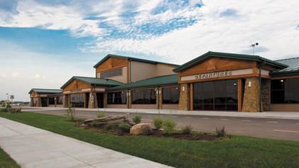 Exterior view of Branson airport featuring the departures terminal, supporting reliable shuttle from Branson Airport to Branson for vacation travel.