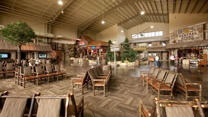 Rustic-style interior of the Branson airport with ample seating and shops