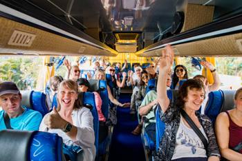 excited to travel - coach bus stock pictures, royalty-free photos & images